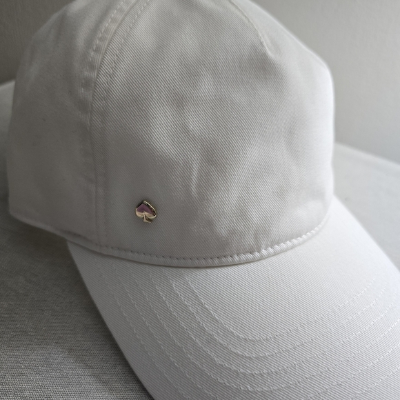 kate spade white baseball cap with gold and pink spade charm main image 12